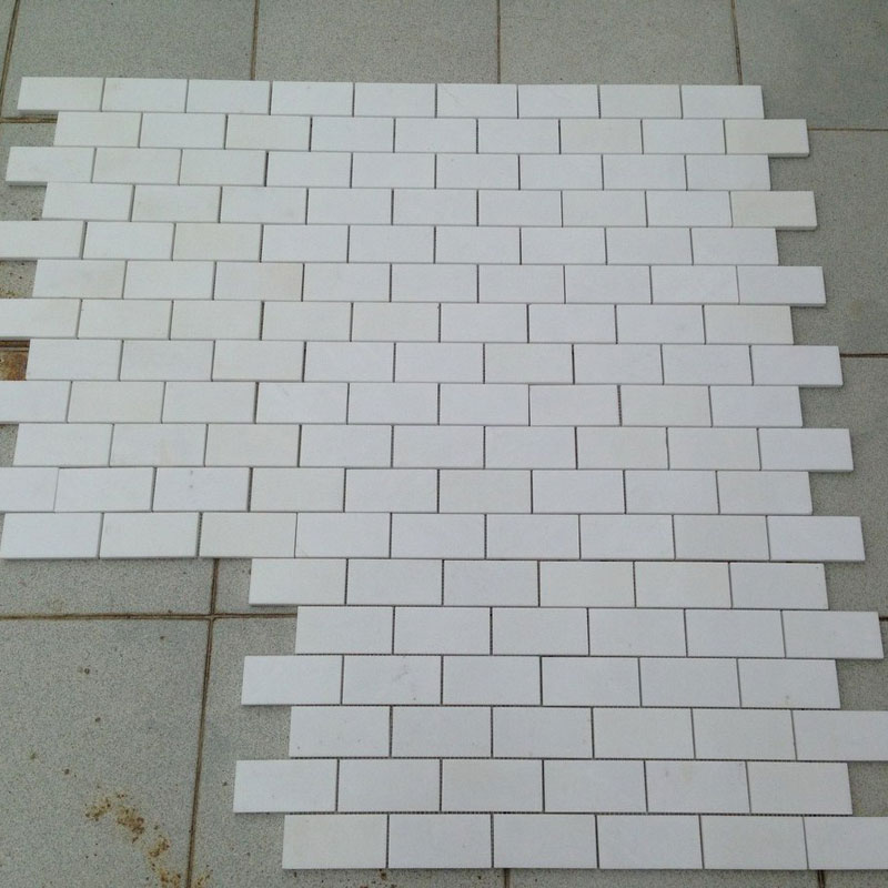 pure white marble subway brick tiles bathroom