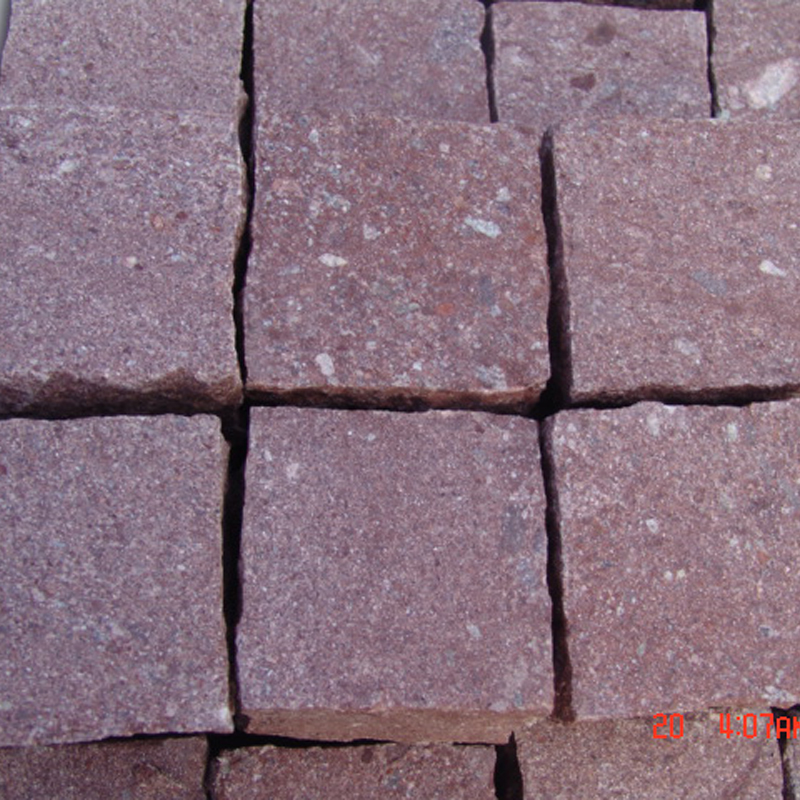 red granite cobblestone paving