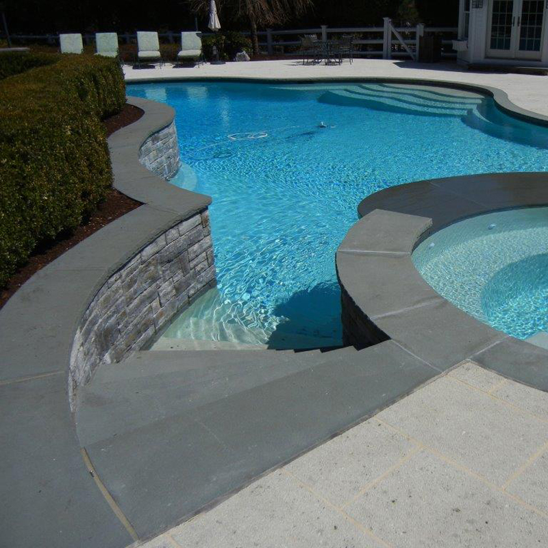 Curved bluestone bullnose Pool coping and Bluestone Pavers
